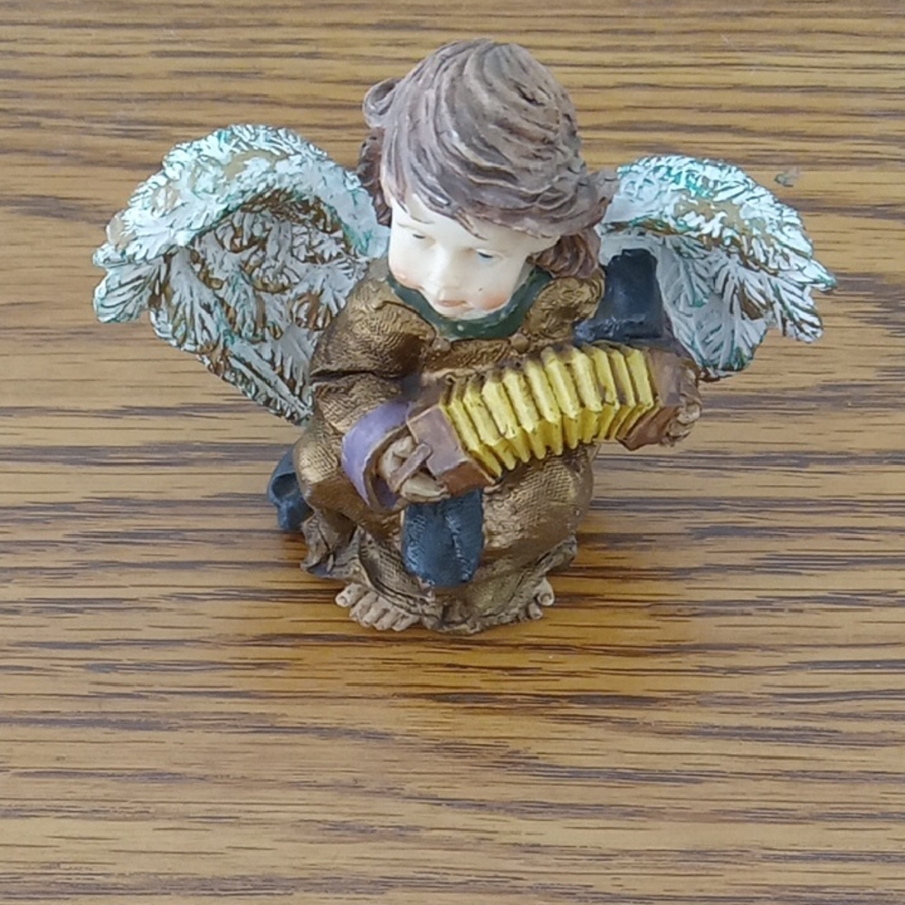 Angel Boy Ceramic Figurine Playing An Accordion